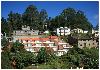 Kodai Resort Long shot view of cottags